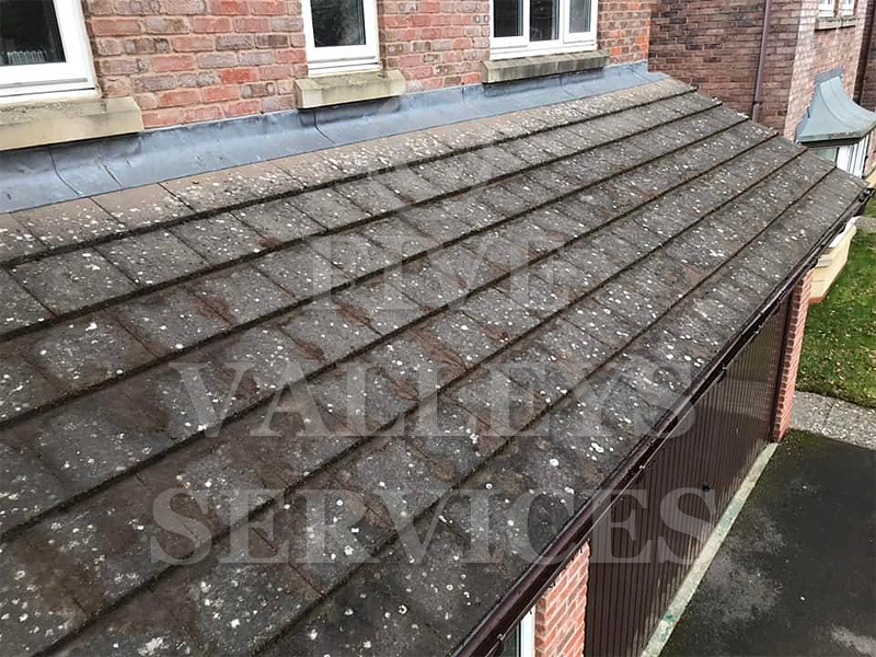 A tiled garage roof after cleaning