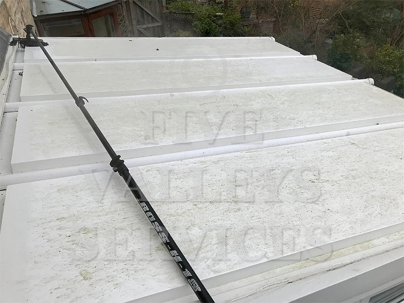 A painted metal conservatory roof in Rodborough before cleaning