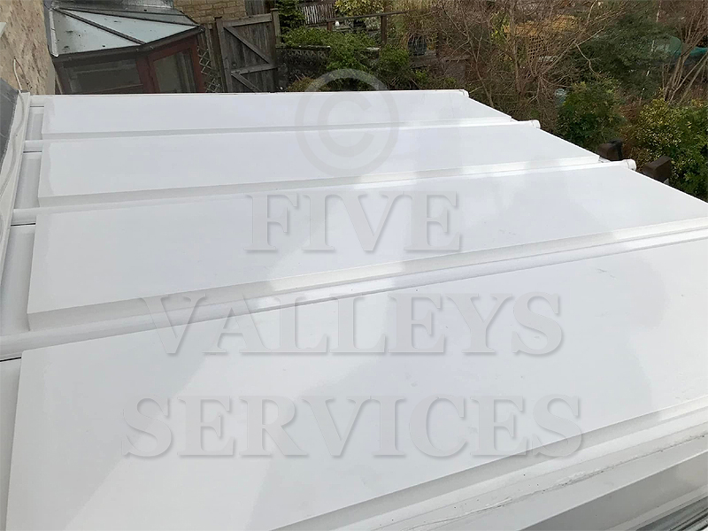 The same metal conservatory roof cleaned